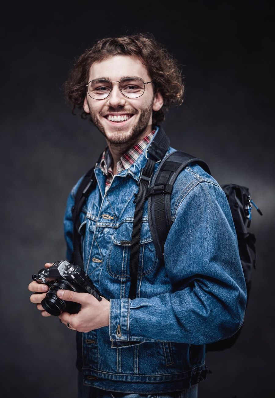 portrait-of-a-handsome-young-photographer-with-cur-2023-11-27-05-18-00-utc (1)